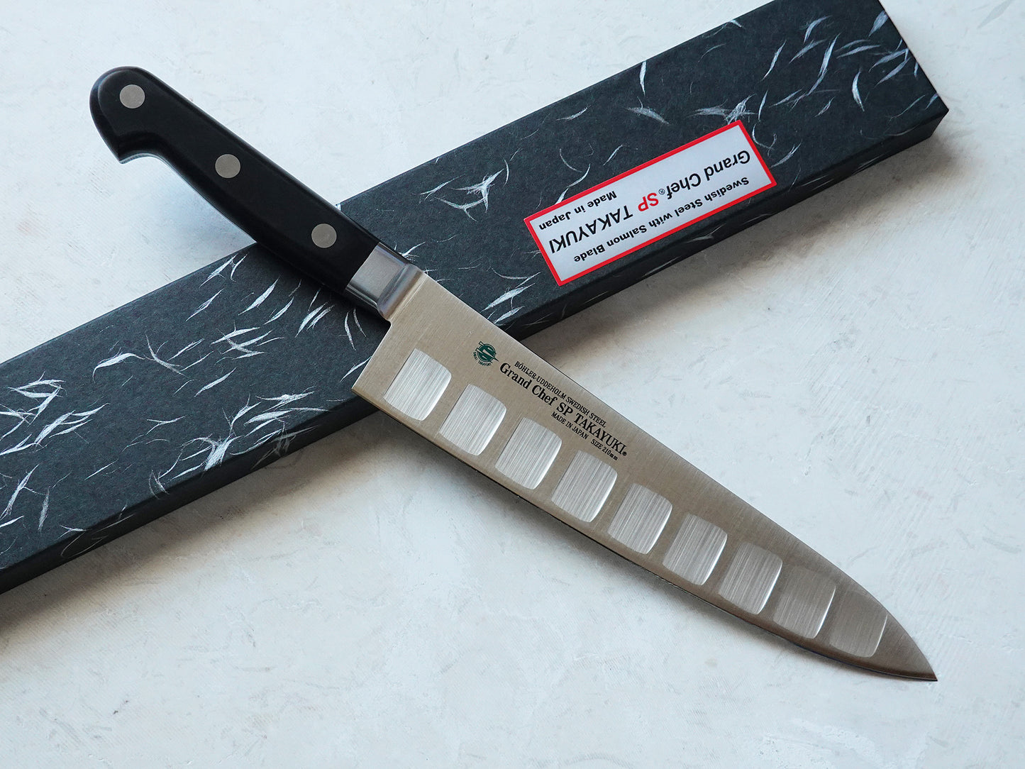 CA008 Cuchillo Japonés Gyuto con borde hueco Acero sueco Sakai Takayuki 21cm