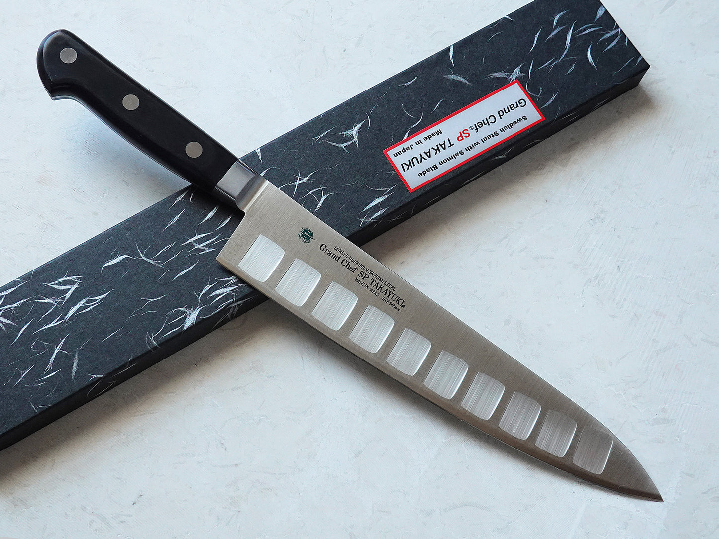 CA009 Cuchillo Japones Gyuto con borde hueco Acero sueco Sakai Takayuki 24cm